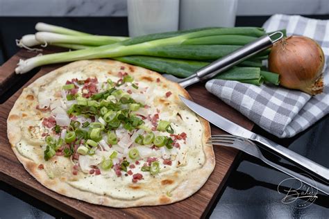  Tarte Flambée: Zesty Alsatian Delight With Crispy Thin Crust and Creamy Fromage Blanc!